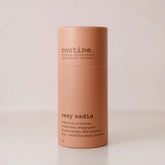 Sexy Sadie Natural Deodorant stick on a white countertop showing minimalist eco-friendly packaging.